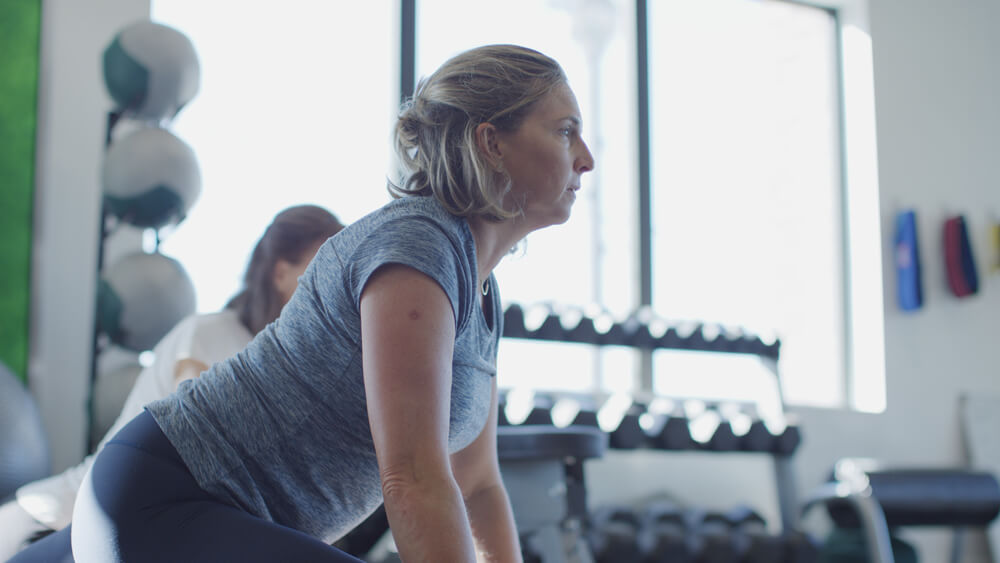 Woman performing resistance training